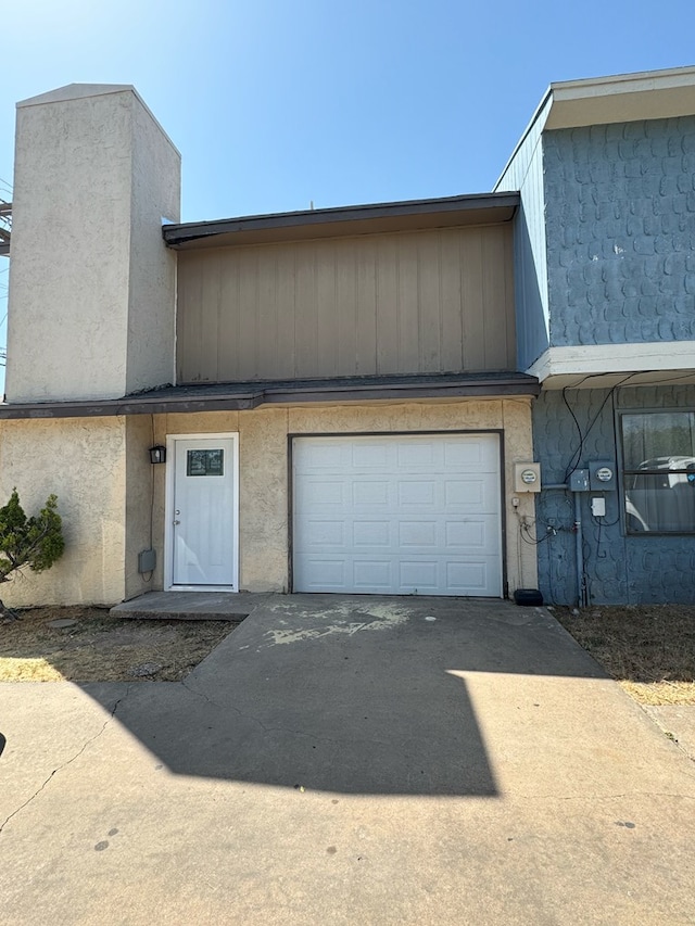 exterior space featuring a garage