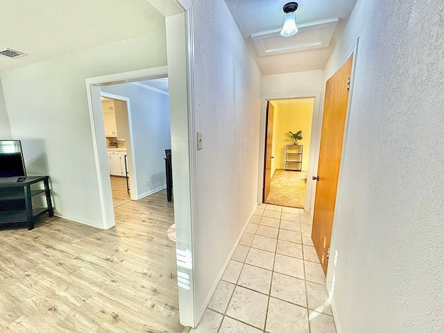 hall featuring light hardwood / wood-style floors