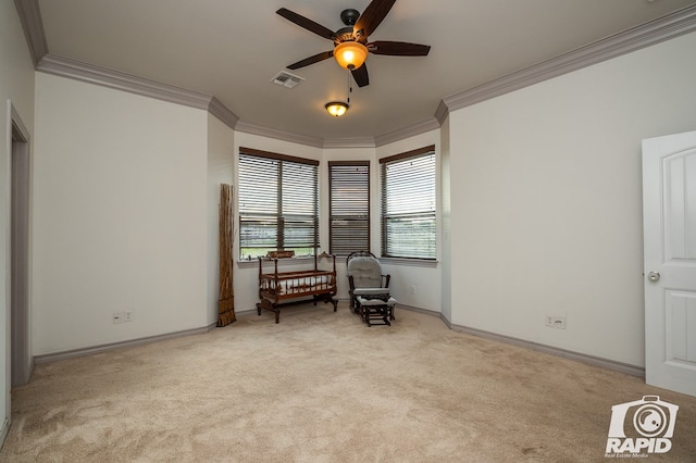 living area featuring light carpet, ornamental molding, and ceiling fan