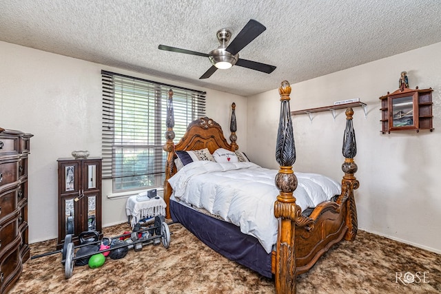 1103 E 43rd St, San Angelo, TX 76903 - bedroom with a textured ceiling, carpet flooring, and ceiling fan