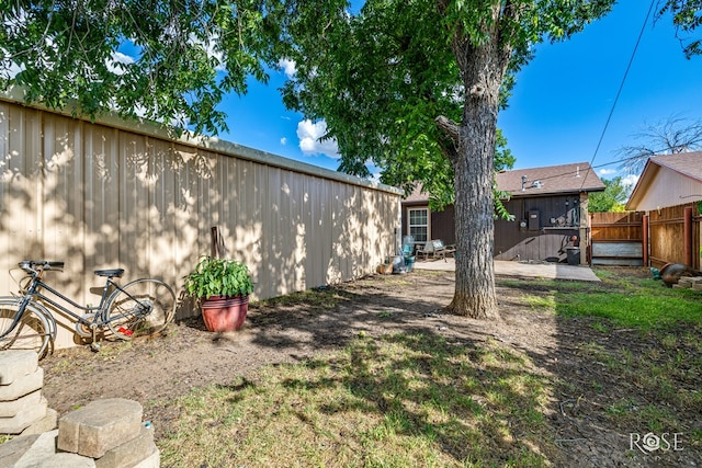 1103 E 43rd St, San Angelo, TX 76903 - fenced backyard with a patio area