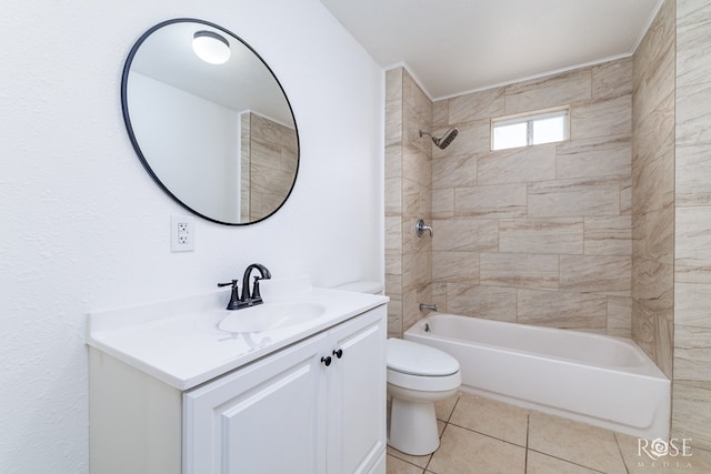 full bathroom with tile patterned floors, toilet, tiled shower / bath combo, and vanity