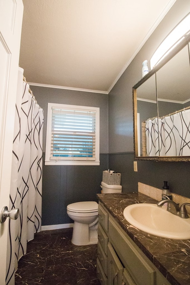 full bathroom with vanity, baseboards, ornamental molding, toilet, and marble finish floor