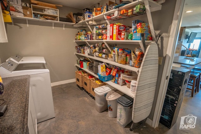 pantry featuring washing machine and dryer