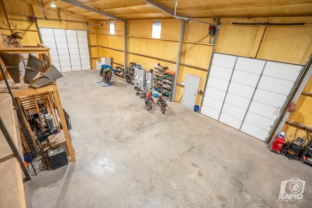 garage with wood walls