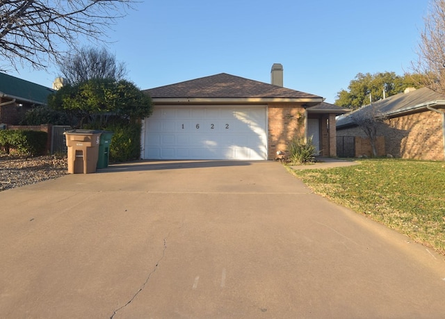 ranch-style house with fence, driveway, an attached garage, a chimney, and brick siding