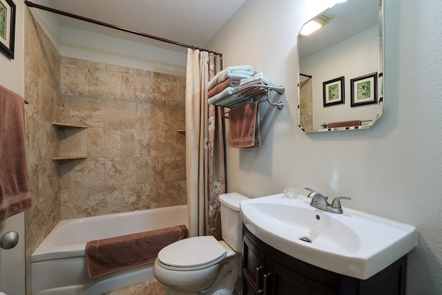 full bathroom featuring vanity, toilet, and shower / bath combo with shower curtain