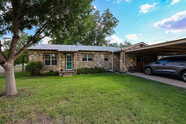 single story home featuring a carport and a front yard