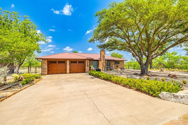 view of front of home with a garage