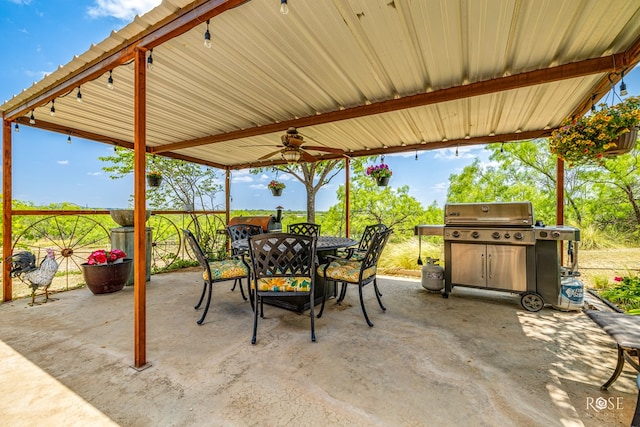 view of patio with a grill and ceiling fan