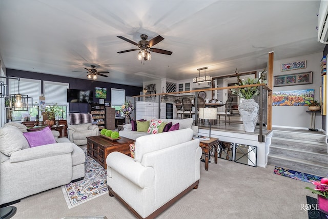 carpeted living room featuring ceiling fan