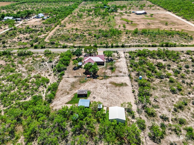 birds eye view of property featuring a rural view