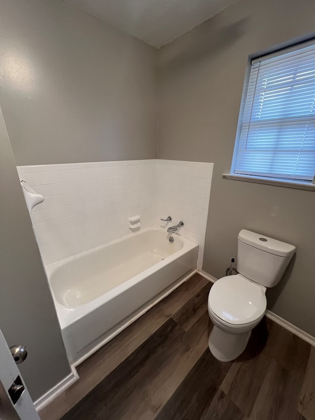 3222 Southland Blvd, San Angelo, TX 76904 - full bathroom with a bath and wood finished floors