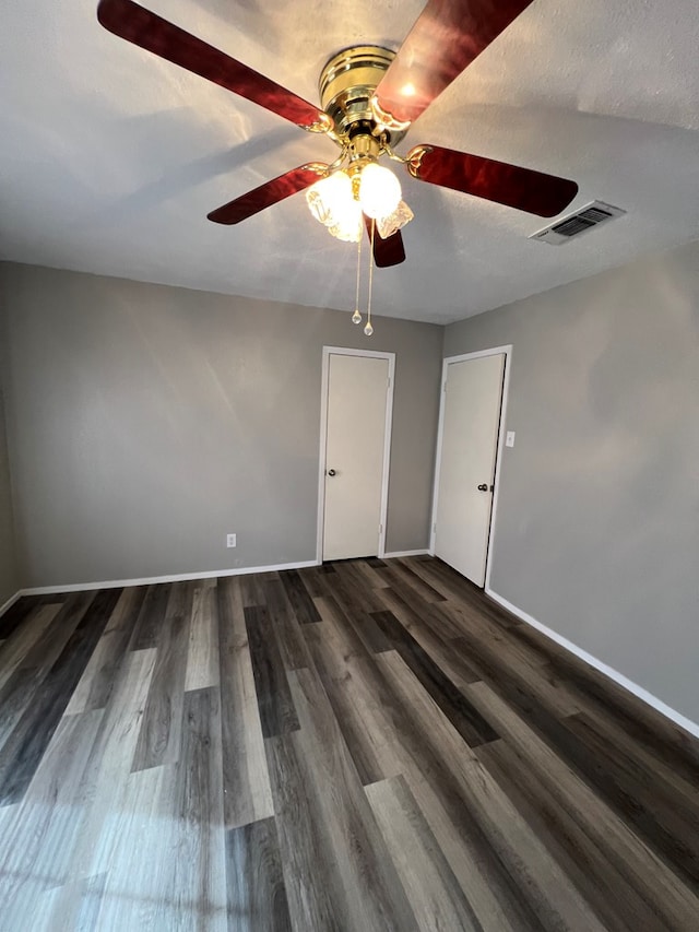 3222 Southland Blvd, San Angelo, TX 76904 - unfurnished room featuring a ceiling fan and dark wood finished floors