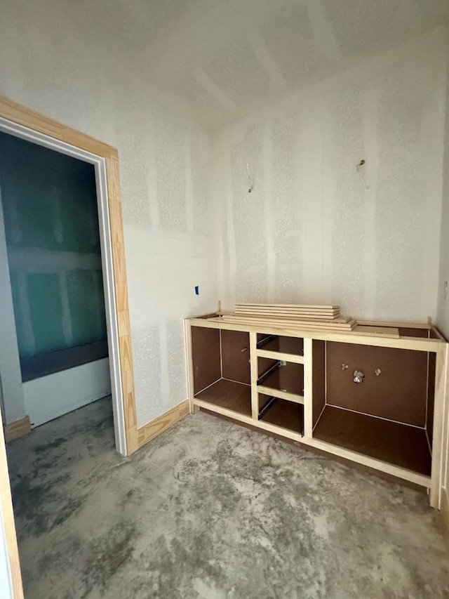 bathroom with concrete floors