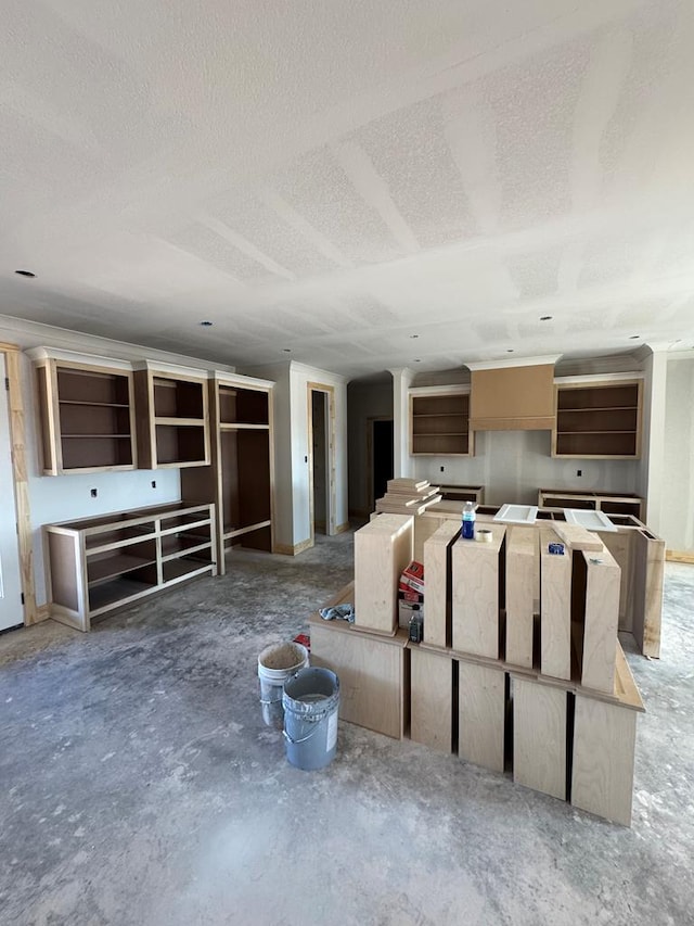 unfurnished living room featuring a textured ceiling