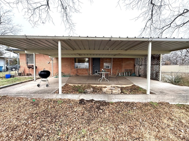 view of patio featuring a carport