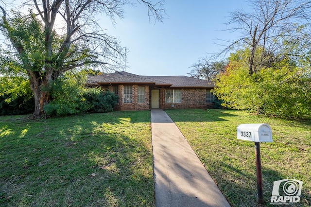 view of front of home with a front lawn