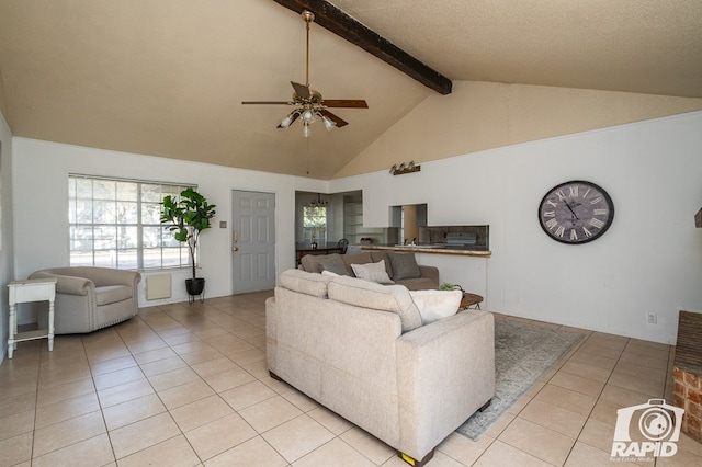 tiled living room featuring beam ceiling, high vaulted ceiling, and ceiling fan