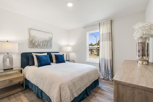 bedroom featuring wood-type flooring