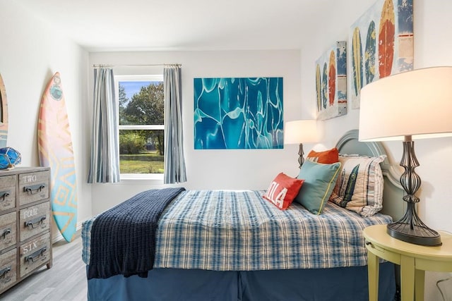 bedroom featuring light wood-type flooring