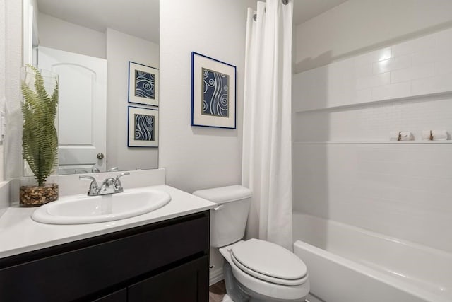 full bathroom featuring vanity, toilet, and shower / bath combo with shower curtain