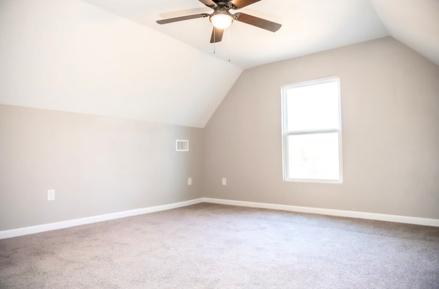 bonus room featuring vaulted ceiling, ceiling fan, and carpet flooring