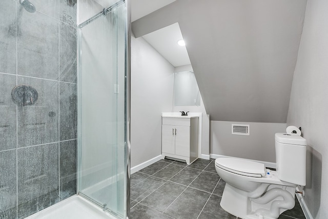 bathroom featuring lofted ceiling, toilet, a shower with shower door, vanity, and tile patterned flooring