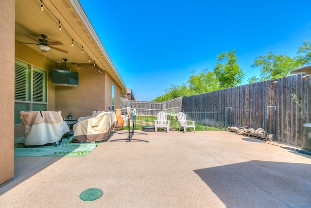 view of patio / terrace featuring ceiling fan and a fenced backyard