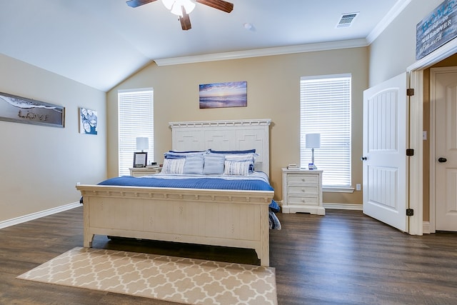 bedroom featuring dark wood-type flooring, visible vents, crown molding, and baseboards