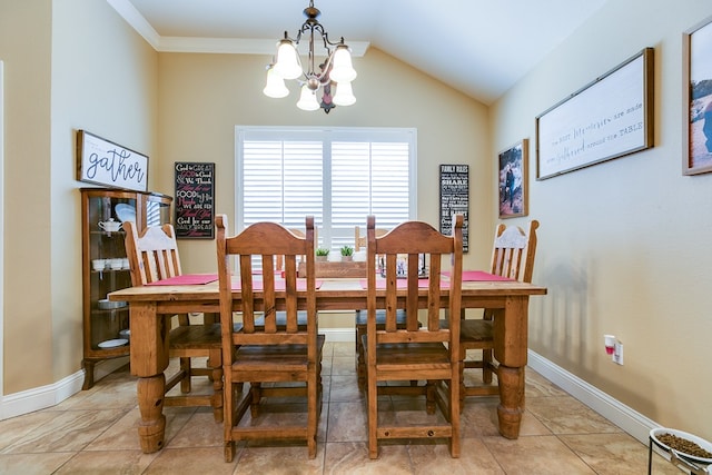 dining area with crown molding, lofted ceiling, light tile patterned floors, baseboards, and a notable chandelier