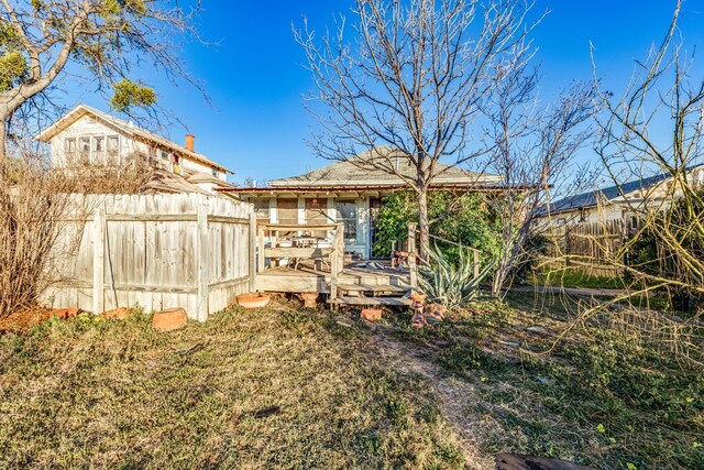 219 Bird St, San Angelo, TX 79603 - exterior space with a deck and fence