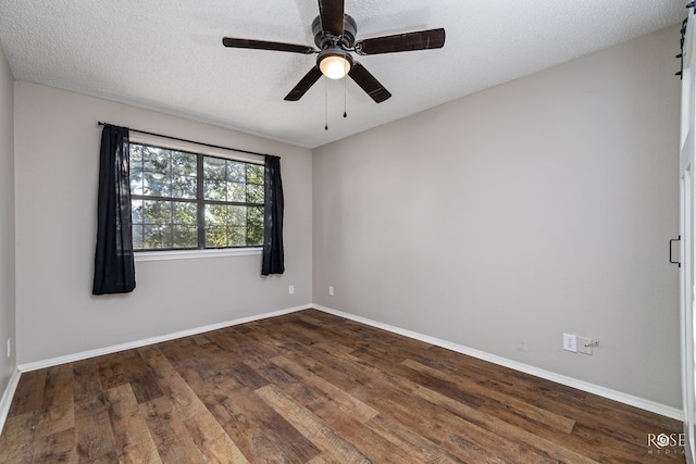 unfurnished room featuring ceiling fan, wood-type flooring, and a textured ceiling