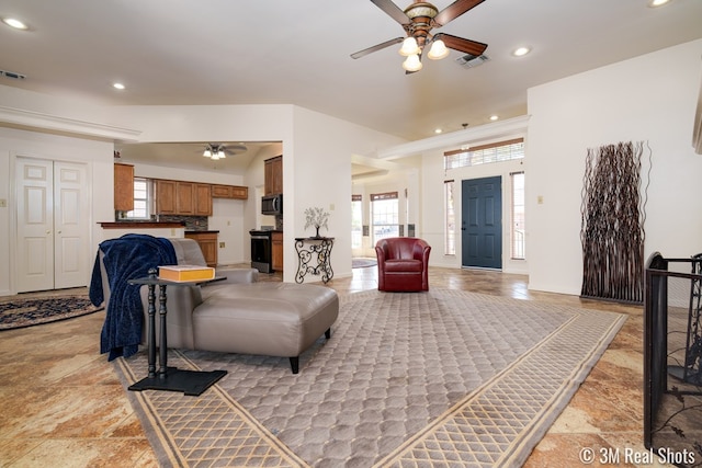 living room with a ceiling fan, recessed lighting, visible vents, and baseboards