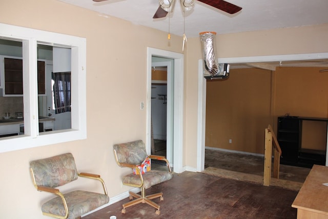 interior space featuring ceiling fan