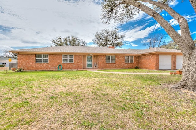 single story home with brick siding, an attached garage, and a front lawn