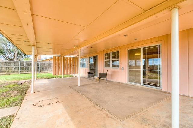 view of patio / terrace featuring fence