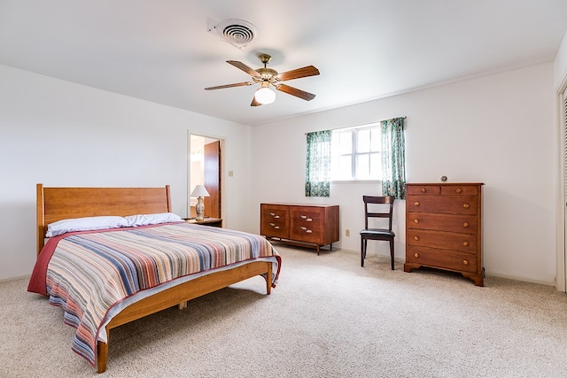 bedroom featuring carpet, visible vents, and a ceiling fan