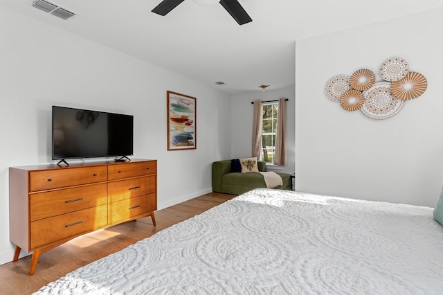 bedroom featuring ceiling fan and light wood-type flooring