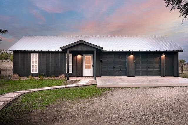 ranch-style home with a garage