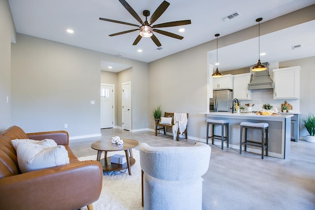 2114 Deaton St, San Angelo, TX 76903 - living room with a ceiling fan, recessed lighting, and baseboards