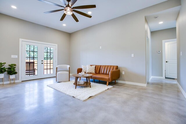 2114 Deaton St, San Angelo, TX 76903 - living area with concrete floors, french doors, a ceiling fan, baseboards, and recessed lighting