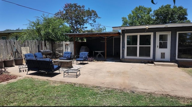 2709 Rice Ave, San Angelo, TX 76904 - view of patio featuring an outdoor living space with a fire pit