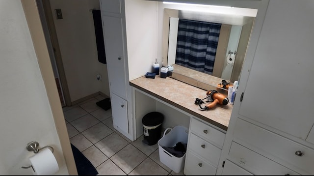 2709 Rice Ave, San Angelo, TX 76904 - bathroom with tile patterned flooring and vanity