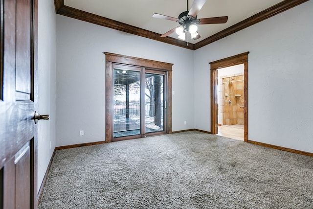 unfurnished room featuring crown molding, carpet flooring, baseboards, and a ceiling fan