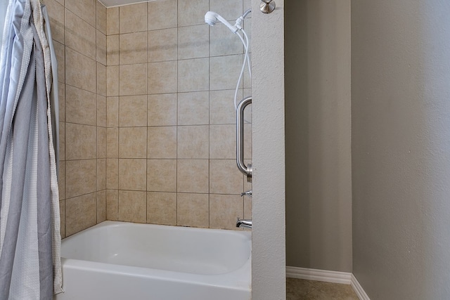 bathroom with shower / tub combo