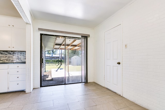 doorway with brick wall