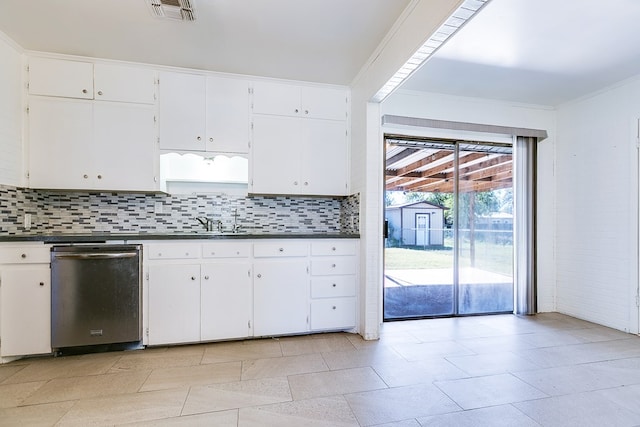 kitchen with tasteful backsplash, white cabinetry, sink, stainless steel dishwasher, and crown molding