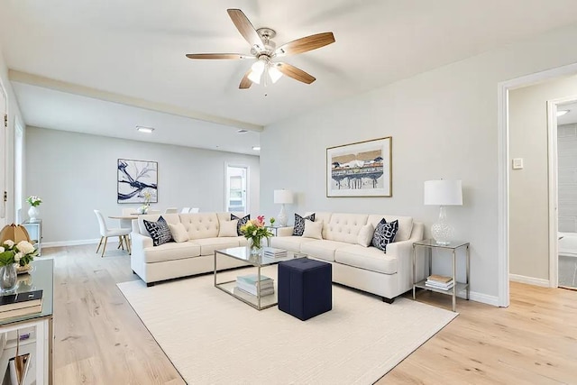 206 N Montague Ave, San Angelo, TX 76905 - living room with ceiling fan, baseboards, and light wood-style floors