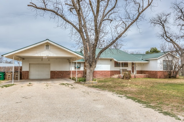 single story home featuring fence, driveway, a front lawn, a garage, and brick siding